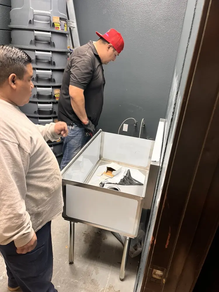 Commercial plumbing and sink installation in White House